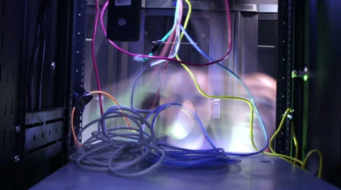 People working in computer server room data center. Walking along rows of super Stock Footage 32723600