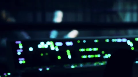 People working with computer servers in dark room at night Stock Footage 344986624