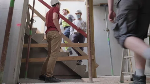 People working in a construction building Stock Footage 289390470