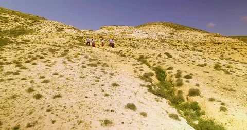 People working in desert Stock Footage 89577161