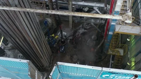People working inside the drilling station, day Video stock 143318885