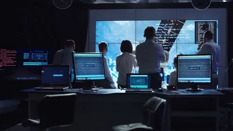 People working in mission control center Stock Footage 79078423