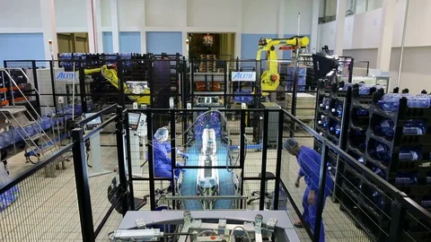 People working at new large and modern warehouse of pure bottled water Video stock 71201211