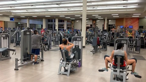 People Working Out On Exercise Machines IMG 4374 Video stock 119542310