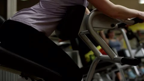 People Working Out on Weight Machines, Fitness Gym Interior, Medium Shot Stock Footage 341446321