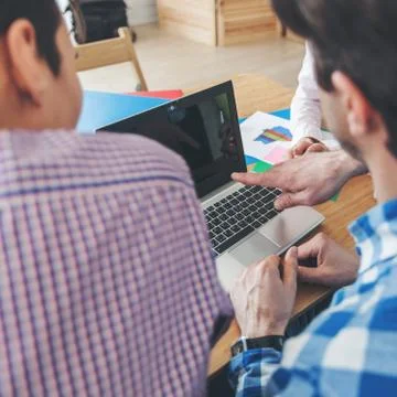 People working with reports Stock Photos