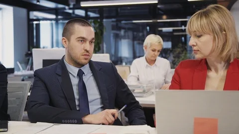 People working together with important documents inside office Stock Footage 113649223