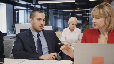 People working together with important documents inside office Stock Footage 119421051