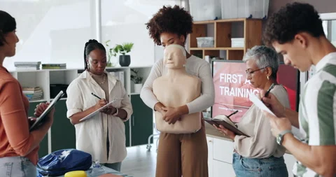 People, writing or dummy for first aid training for rescue safety, demonstration Stock Footage 306153783