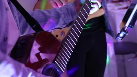 People's hands play musical instruments 스톡 동영상 336847282