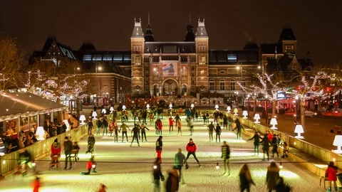 Peoples on the ice skating ring  on the beautiful Museumplein near Rijksmuseum Stock-Footage 101942981