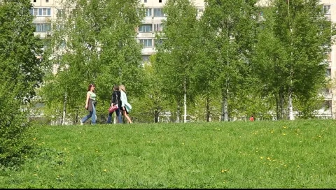 Peoples in the park, walking, running and using bicycle Stock Footage 5299554