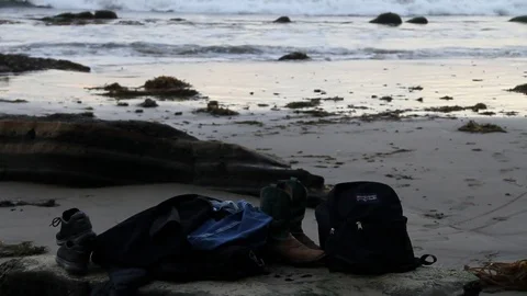 Peoples possessions at the beach. Stock Footage 83164723