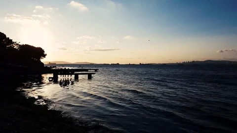 Peoples Watching Sunset At The Seaside Stock Footage 83746217