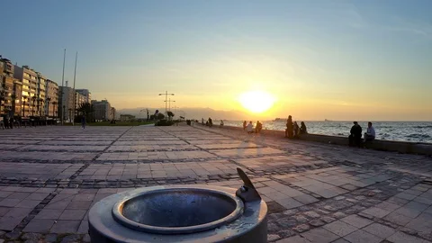 People,sea at sunset, time lapse. Stock Footage 97972325