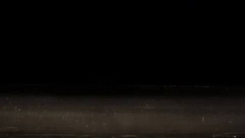 Peper falling on wet surface in slow motion Stock Footage 88801597