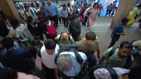 Pepole Rush to Board Local Train at station Mumbai city. 4K (Time lapse) Stock Footage 248613979