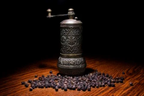 Pepper  beans and grinder Stock Photos