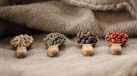 Pepper Blend spices small spoon on top sackcloth Video stock 34161231
