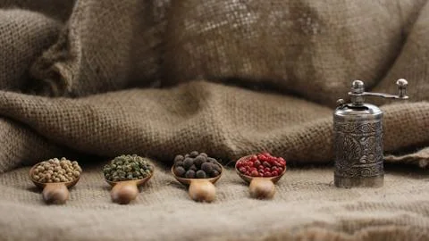 Pepper Blend spices small spoon on top sackcloth Stock Photos