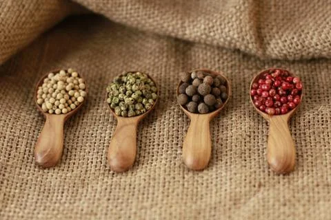 Pepper Blend spices small spoon on top sackcloth Stock Photos
