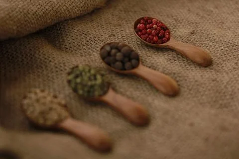 Pepper Blend spices small spoon on top sackcloth Stock Photos
