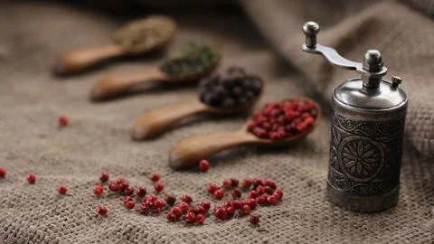 Pepper Blend spices small spoon on top sackcloth Stock Photos