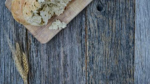 Pepper bread on rustic wood background. Stock Photos