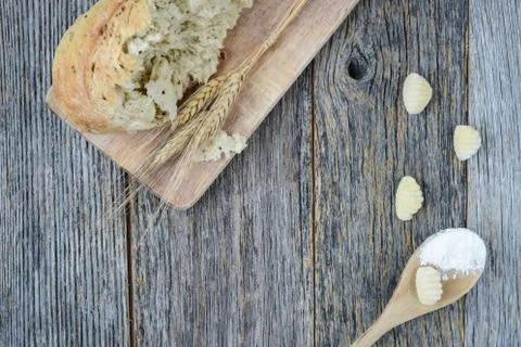 Pepper bread on rustic wood background. Stock Photos