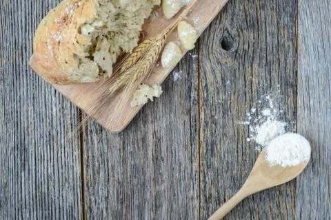 Pepper bread on rustic wood background. Stock Photos
