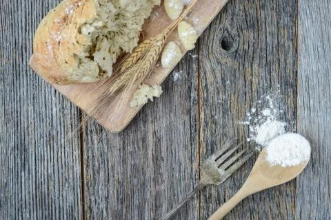 Pepper bread on rustic wood background. Stock Photos