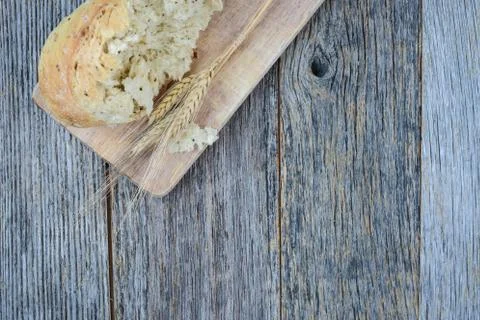 Pepper bread on rustic wood background. Stock Photos