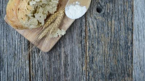 Pepper bread on rustic wood background. Stock Photos