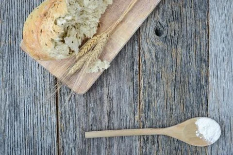 Pepper bread on rustic wood background. Stock Photos