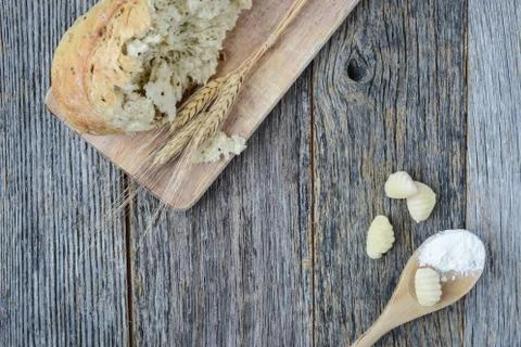 Pepper bread on rustic wood background. Stock Photos