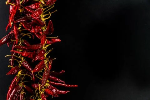 Pepper chilli string copyspace on right, landscape, close up Stock Photos