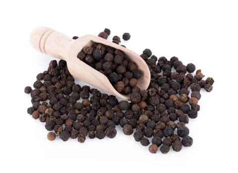 Pepper corn on white background Photos