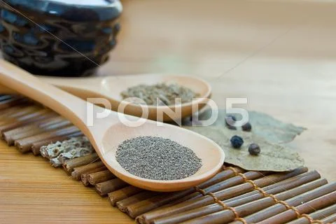Pepper, cumin and bay leaf Stock Photos