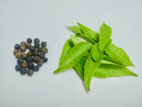 Pepper, curry leaf On A White Background Stock Stock Photos