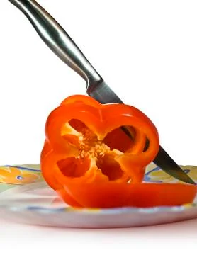 Pepper cut a knife Stockfoto's