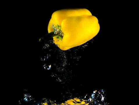 Pepper dive into water Foto stock