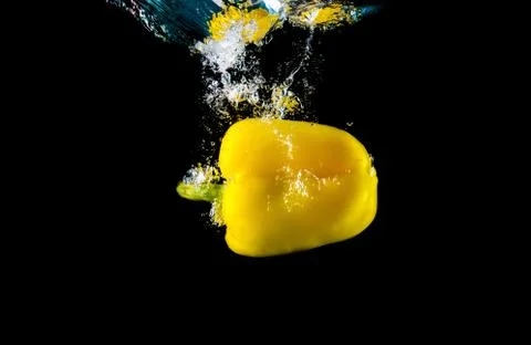 Pepper dive into water Фото