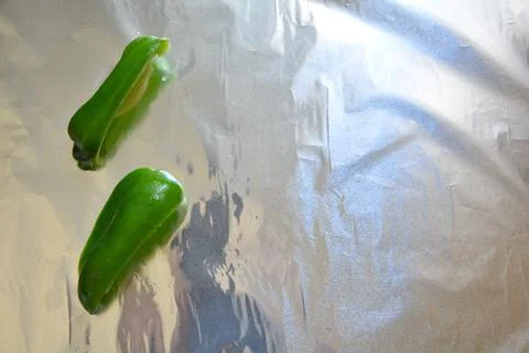 Pepper on a foild different slices Stock Photos