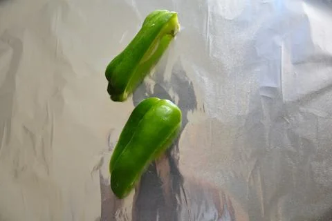 Pepper on a foild different slices Stock Photos