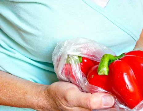 Pepper in human arm Stock Photos