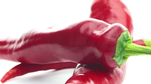Pepper isolate. red hot pepper on a white background rotates on a turntable Stock Footage 161263914