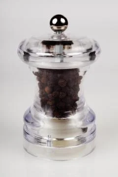 Pepper mill. White background. Close up. Stock Photos