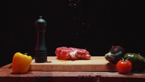 Pepper placed on a meat Stock Footage 152145780