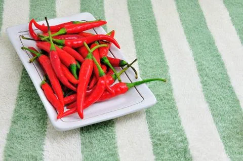 Pepper on a plate Stock Photos