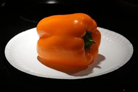 Pepper on a plate Stock Photos